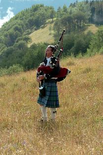 Colorado bagpiper at a wedding in Winter Park, photo by Debbie Malone