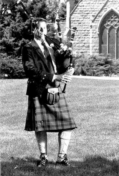 Colorado bagpiper at a wedding at DU Evans Chapel, photo by Bill Freeman at Insight (303)670-5566